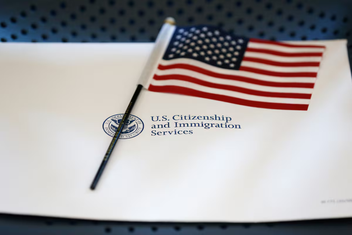The Trump administration reverses stricter green card requirements.